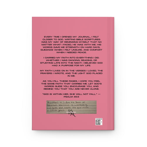 Peace Journal in pink with inspirational text and a handwritten note on the cover.